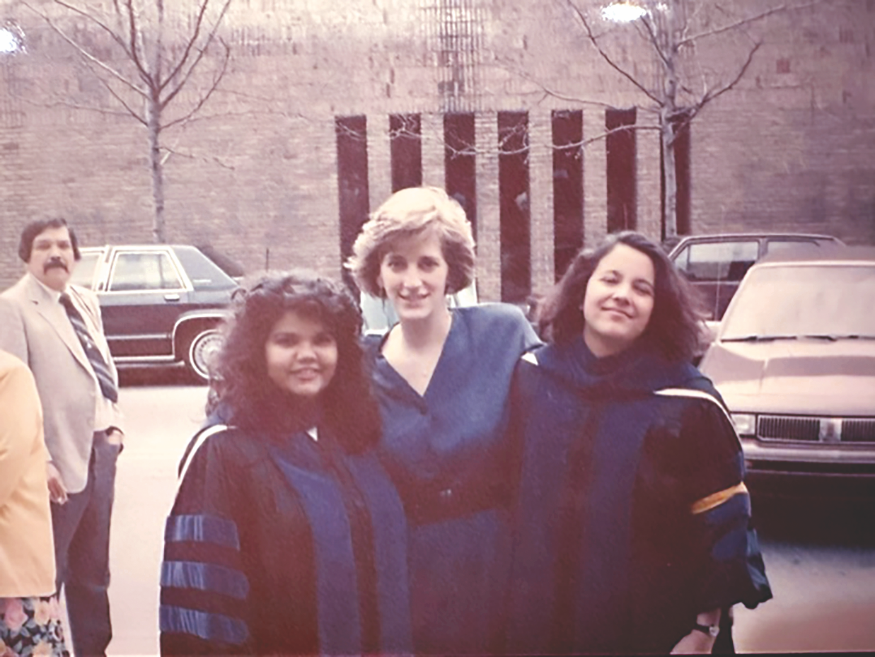 Anita graduating from Law School with friends