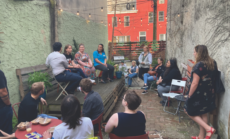 Members of Just philly in a backyard