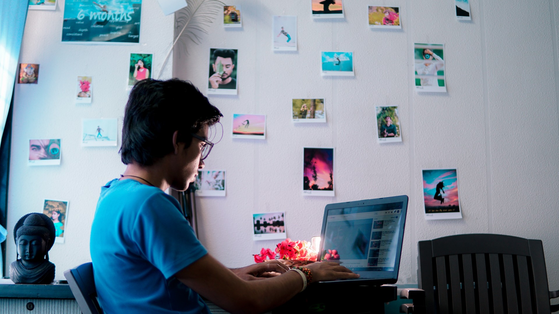 Man wearing a blue shirt sitting at his computer; Photo by Kaushal Moradiya from Pexels