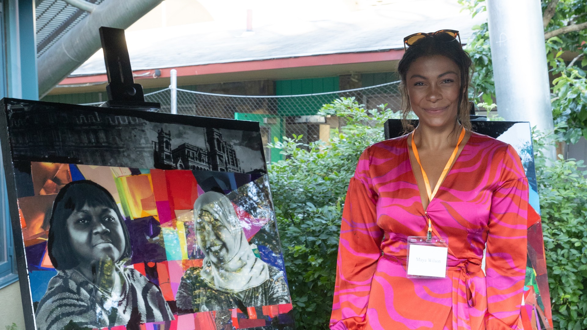 Maya Wilson poses next to one her pieces of art at our Jubilee for Justice